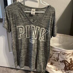 Women’s pink brand v-neck t-shirt.  Size L.  Great condition!!